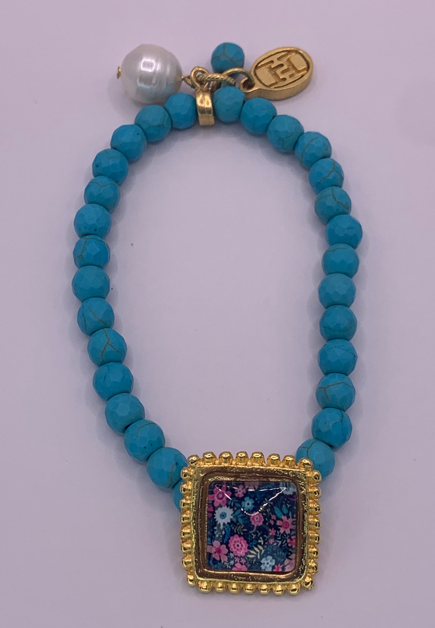 Black & flowers turquoise bracelet. ITEM 423